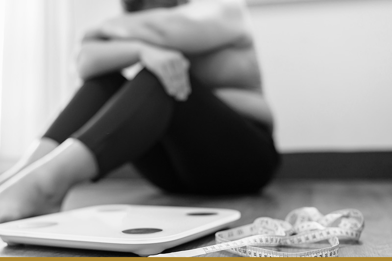 Weight gain as a symptom of a slow metabolism.