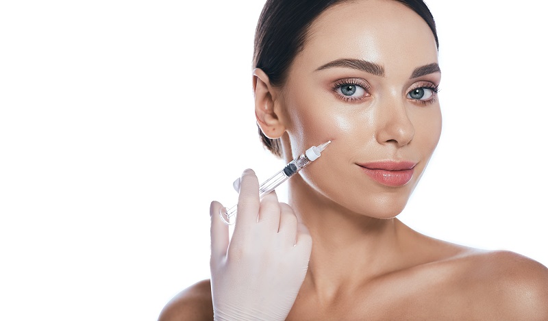 Using dermal fillers to enhance collagen production
