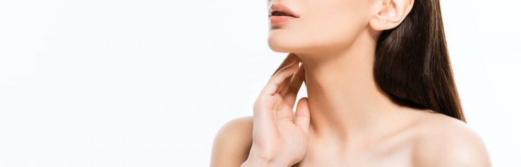 A woman posing with her chin up