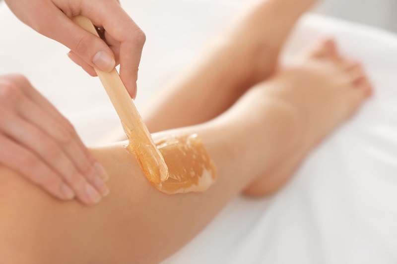 Waxing by a cosmetic provider
